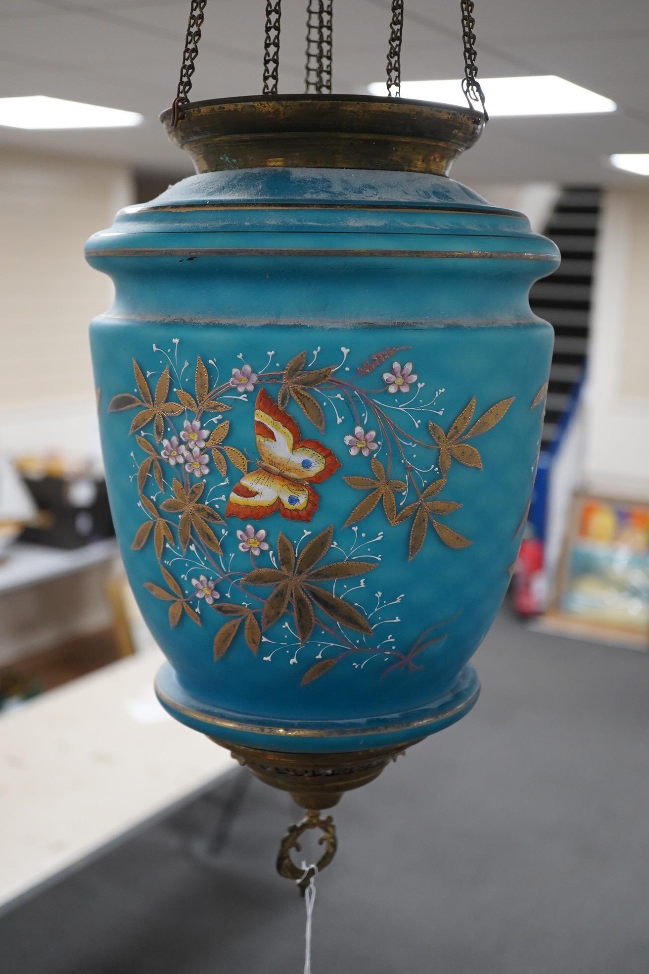 A Biedermeier enamelled blue glass hanging lamp, 36cm high. Condition - fair.